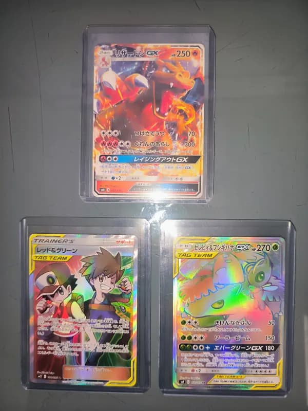 3 Pokémon cards - Tag Team and Charizard GX